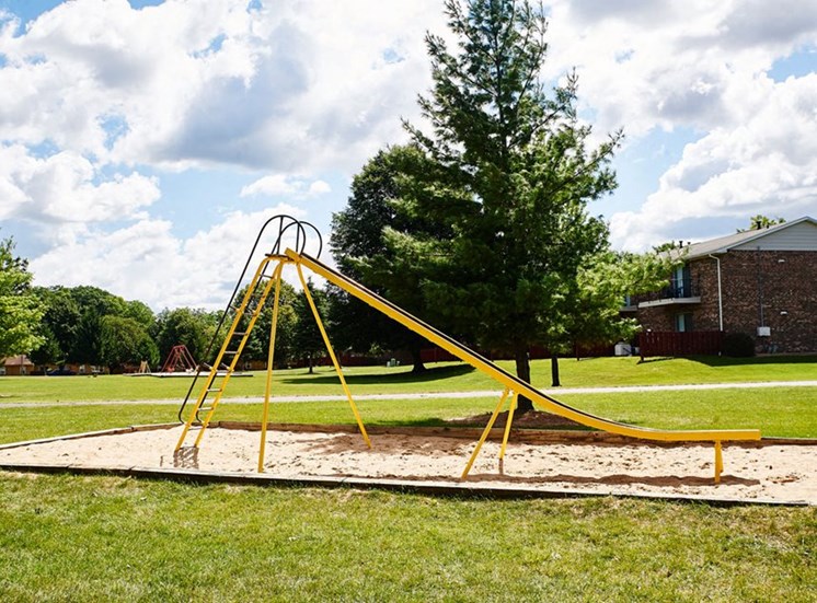 Play Park with slides, swings, and more at Cambridge Square in Grand Rapids